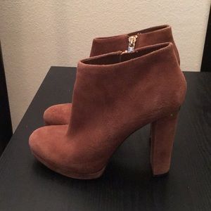 Brown suede Michael Kors booties.